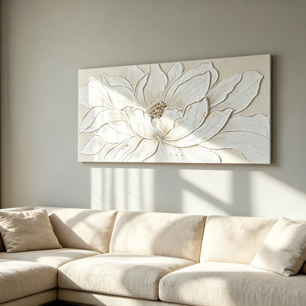Lotus Relief canvas above a cream sectional sofa in a sunlit living room