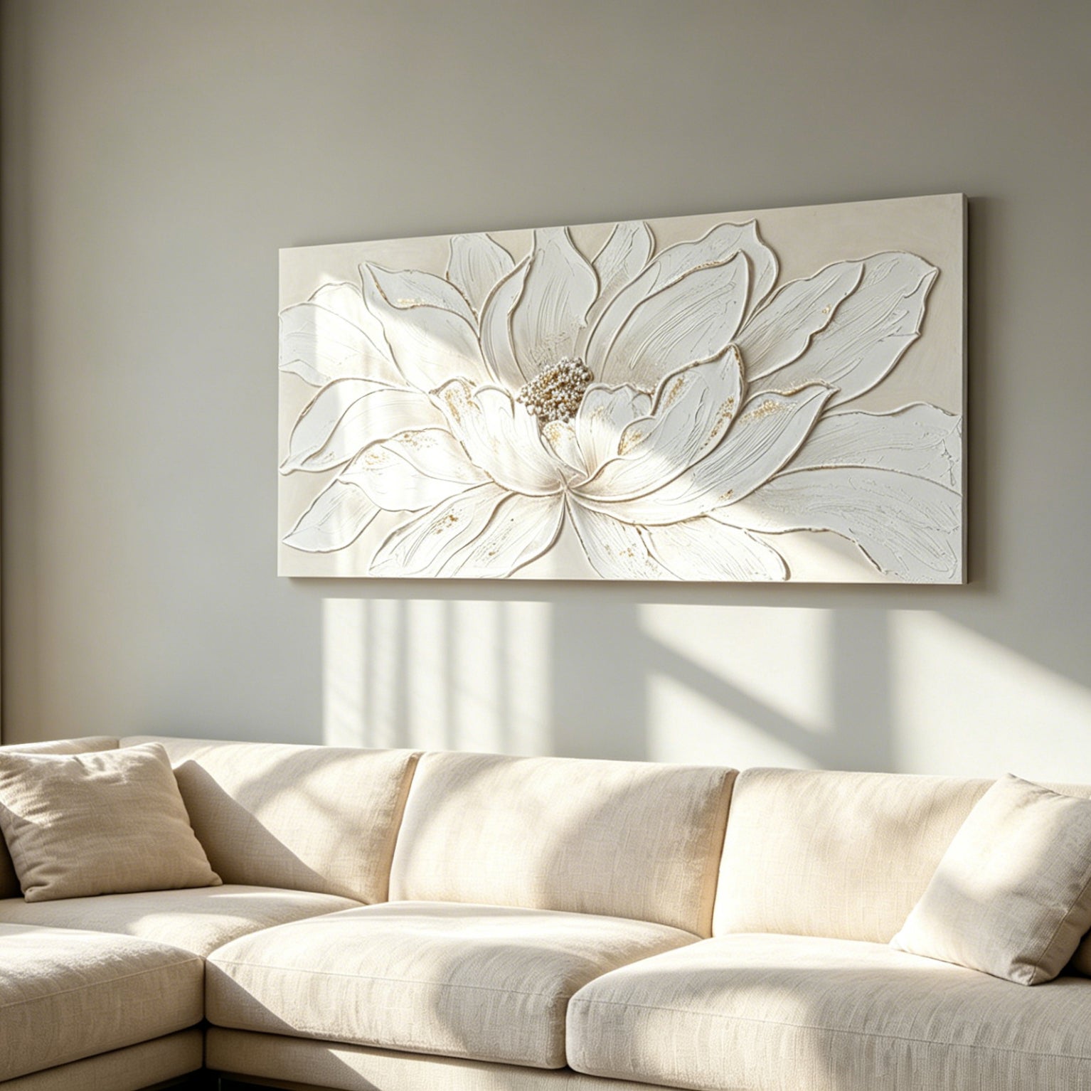 Lotus Relief canvas above a cream sectional sofa in a sunlit living room