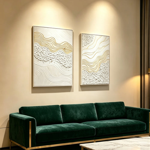 Alabaster diptych in antique white with gold, hung in a living room