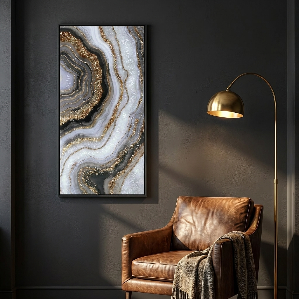 Geode canvas on a charcoal wall beside a leather chair and brass floor lamp