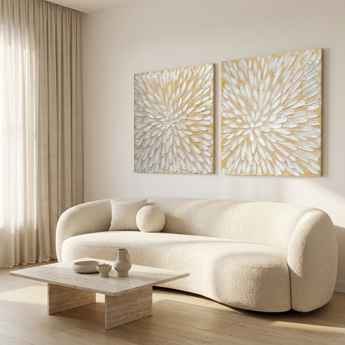 Bloom Impasto pair above a cream sofa in a bright minimal living room
